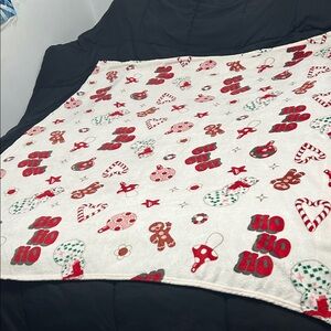 Festive Holiday Blanket with Red and Green Accents used one’s